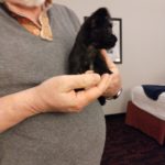 Dad holding Coda for first time